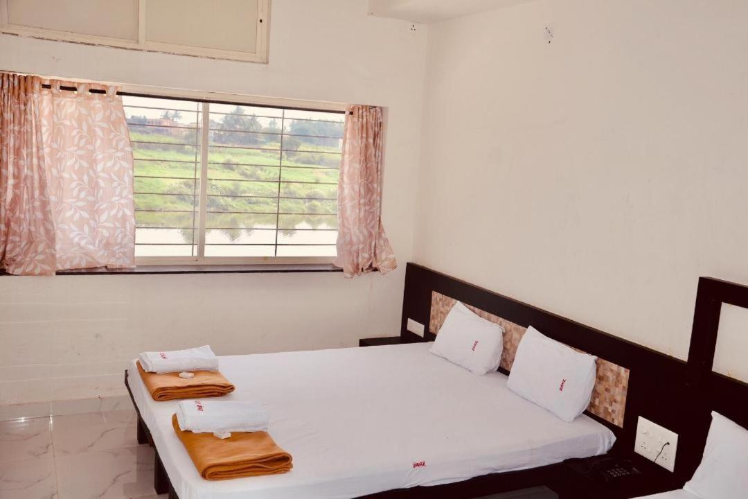 Hotel Mangalam Kurandvad Екстериор снимка